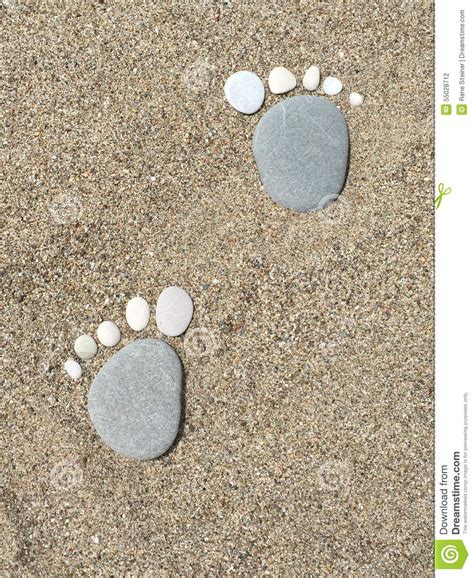 Cute Stone Footprints On The Beach Bigfoot Stock Photo Image Of