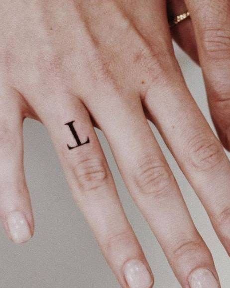 15 Awesome Letter T Tattoo Designs And Ideas