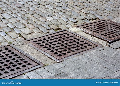 Drainage System Of Urban Infrastructure With An Iron Grating Of The