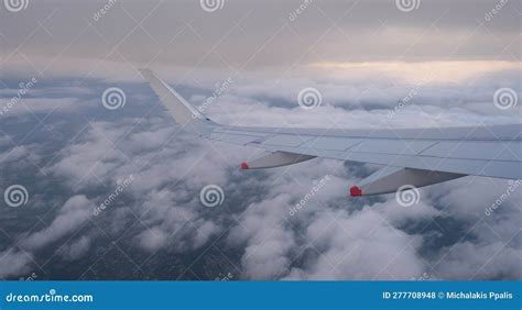 Plane In Flight Above London City United Kingdom Aerial Top View From