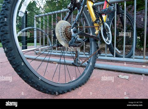 Abandoned Bicycle With A Flat Tire On Bike Rack Stock Photo Alamy