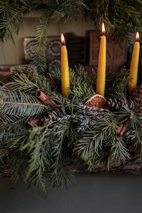 Celebrate The Winter Solstice With A Traditional Yule Log Under A Tin