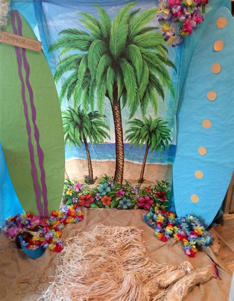 End of Year Luau party backdrop for my stinkers 4th grade class☀️☀️☀️. Surf boards were leftover
