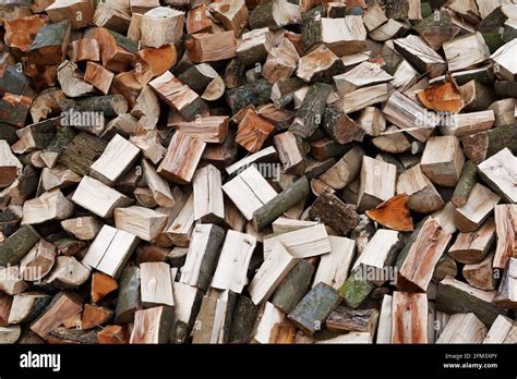 A Pile Of Chopped Firewood Ready For Stacking Stock Photo Alamy