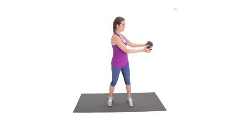 standing ab twist obliques exercises popsugar fitness photo 4