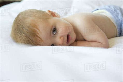 Baby Lying On Blanket Stock Photo Dissolve