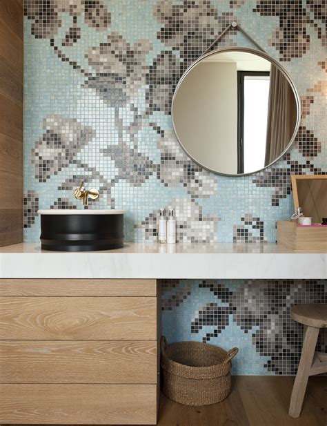 Large wall mirrors make the room appear bigger and bigger. An elegant ensuite and dressing room design