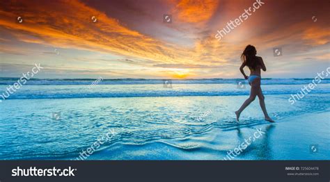 Woman Bikini Running On Beach Sunset Stock Photo 725604478 Shutterstock