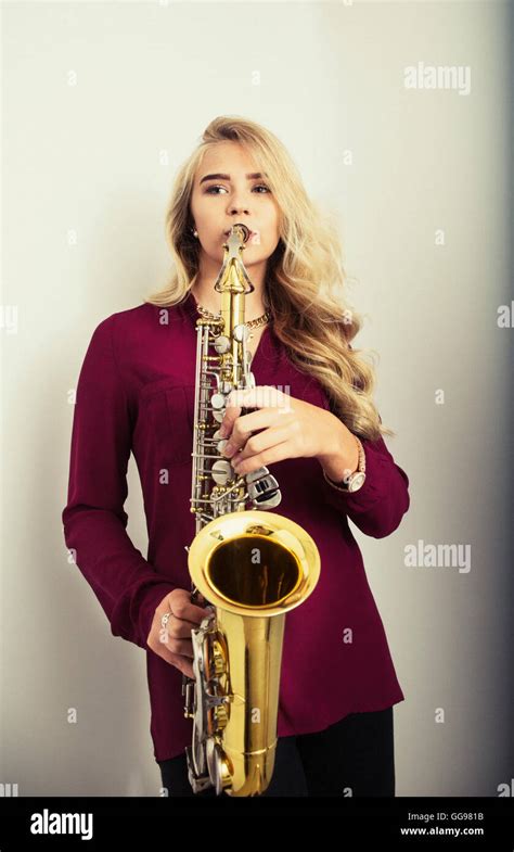 Beautiful Blond Teen Playing Saxophone Stock Photo Alamy