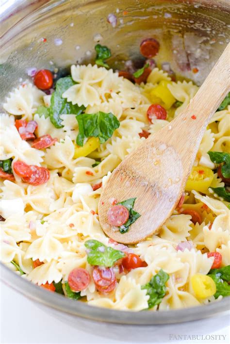 Pasta salad is truly as easy as boiling water if you stick to a simple formula, use a smart pasta cooling trick, and a flavorful dressing. Pasta Salad Recipe - Cold, Italian Style and SO Easy