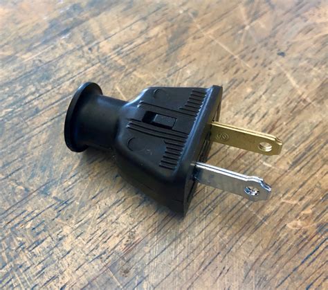 2 Prong Electrical Plug Black Rubber Shell Polarized Male Plug