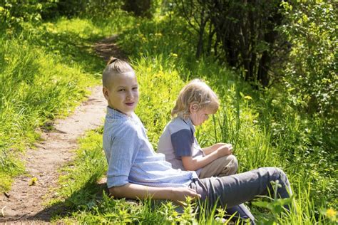 Smiling Blond Brothers In The Park Stock Image Image Of Healthy