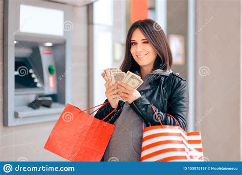 Big Spender Holding Money In Front Of The Atm Stock Image Image Of Excessive Deposit 155875197