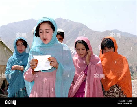 An Afghan School Girl Sings A Prayer In Celebration And For Blessing
