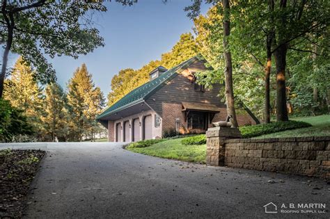 Brick Garage With Classic Green Abseam Roof Ab Martin