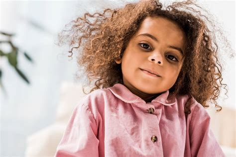 Beautiful Curly African American Child Looking At Free Stock Photo And