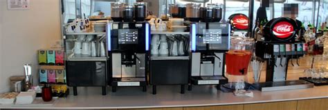 Illy coffee machines singapore airport terminal services. Lufthansa business class lounge, New York JFK Terminal 1 ...