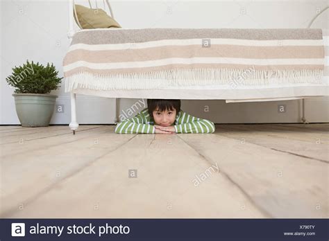 Boy Hiding Under Bed High Resolution Stock Photography And Images Alamy