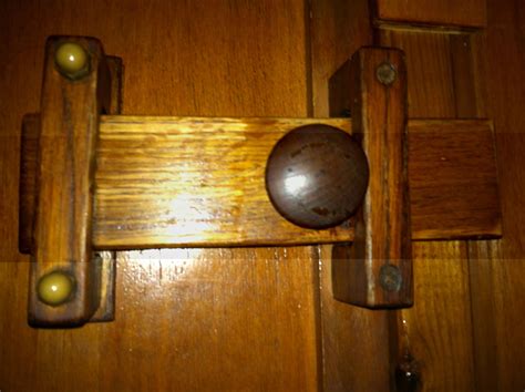 Our cabinet door latches and hardware are also offered in various metal and finishes, from classic polished brass, rustic bronze, nickel, pewter and more to complement your period style home or cabinet restoration project. wooden door latch | Wooden sliding doors, Wooden hinges ...
