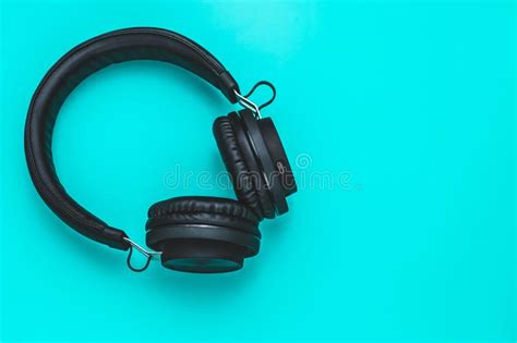 Black Headphones On Turquoise Background Youth Earphones Mockup With