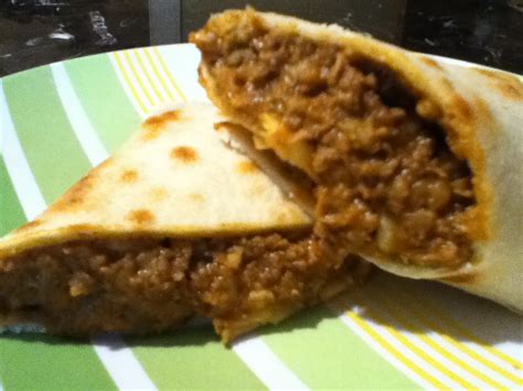 Brown hamburger along with chopped onions. Food Talk Daily Recipes: Beef and Bean Burritos