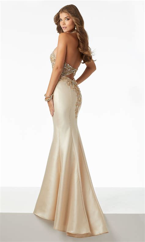 Prom dresses come in standard sizes, which means it may not match your exact body measurements. Halter Ilusion-Bodice Mermaid Prom Dress - PromGirl
