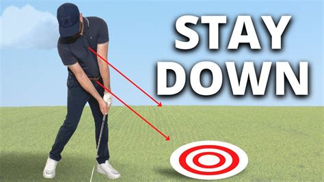 How To Stay Down And Hit The Golf Ball Correctly Youtube
