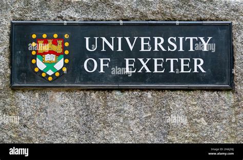 University Of Exeter Sign And Coat Of Arms Crest At Entrance To Streatham Campus Exeter Stock