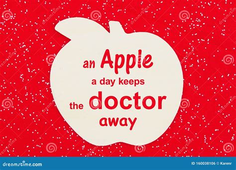 An Apple A Day Keeps The Doctor Away Message With A Wood Apple Stock Photo Image Of Shape