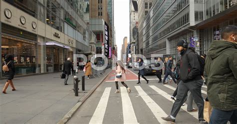 Crowd Of People Walking Crossing Street New York City Gimbal Side Angle