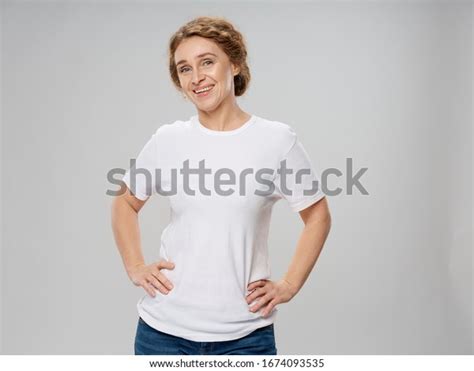 Pretty Elderly Woman White Tshirt Studio Stock Photo Edit Now 1674093535