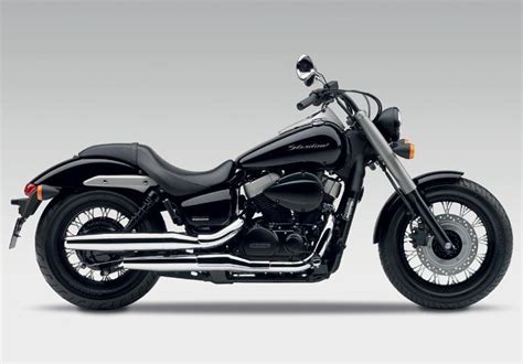 It displaces only 745cc, but even with that low seat, honda's shadow phantom just looks bigger than it is. New Honda Shadow 750 Black Spirit cruiser has lowest seat ...