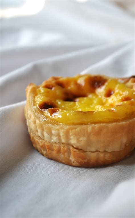 These popular portuguese style egg tarts are sweet, crisp and have a flaky crust. portuguese egg custard tarts - macau in a tartshell | Chow ...