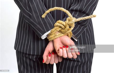 Business Woman With Hands Tied Behind Back Photo Getty Images