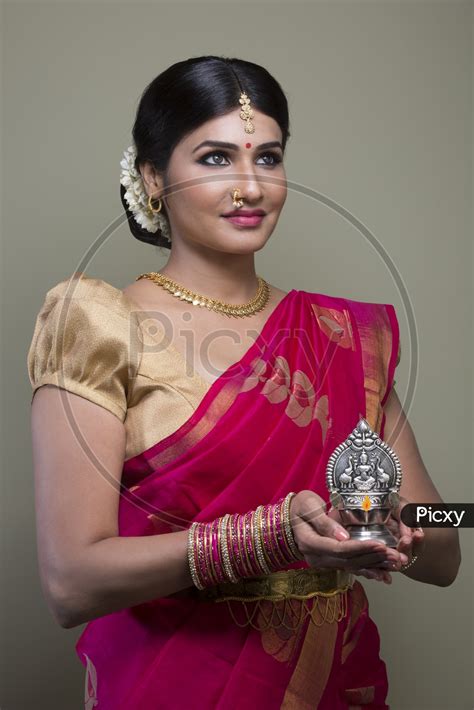 Image Of A Beautiful Indian Female Model In Traditional Attire Wearing
