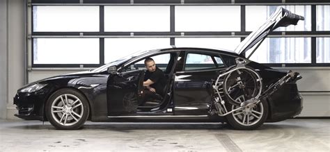 A Tesla Model S Equipped With A Robotic Arm For Your Wheelchair Video