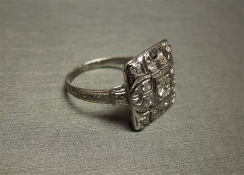 With 95% platinum, the metal is one of the most durable alloys in the world. Art Deco Square Diamond Engagement Ring .42TCW C1940