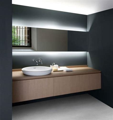 While you may not think about it, the mirror is a central component of the bathroom and essential for daily grooming activities, from. Mesmerizing Backlit Mirror Designs For The Modern Bathroom