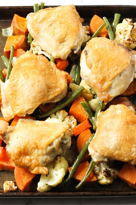 Trim the chicken thighs of any excess fat or skin. Sheet Pan Crispy Baked Chicken Thighs and Vegetables Recipe