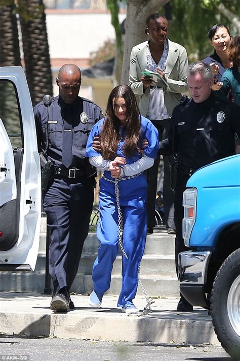 lea michele pictured in a prison uniform while filming scream queens season 2 daily mail online