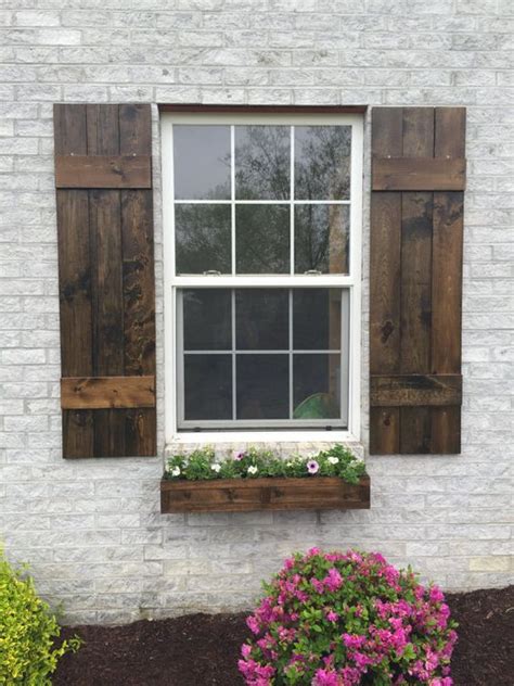 The board and batten z design is simple to build and perfect for a cottage or farmhouse style. ** Farmhouse Board and batten Shutters ** ~ A perfect way ...