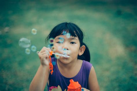 Girl Blowing Bubbles Free Stock Photo Negativespace