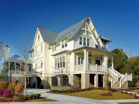 Many coastal house plans draw from the cottage style, which can be smaller in size to create a cozy feeling for its owners. Classic-Cottage-Style-Coastal-Home-Charleston-South ...