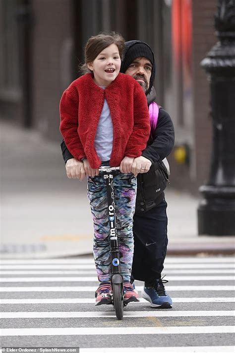Game Of Thrones Peter Dinklage Enjoys Fun Scooter Ride With Daughter