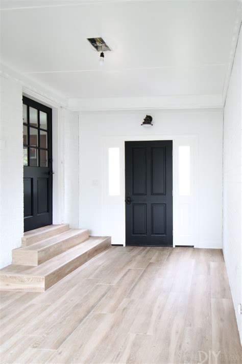 These floors travel all the way into our mudroom. Mudroom Makeover: Faux Wood Ceramic Tile | Mudroom ...