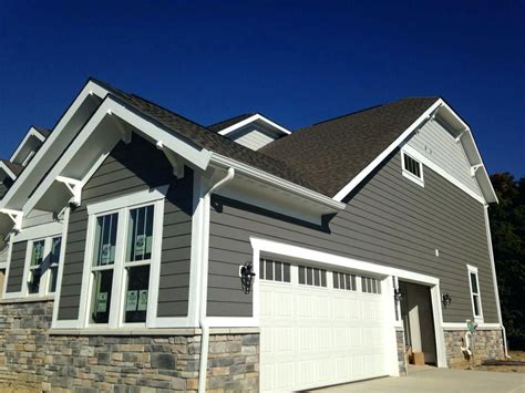The combination of a white house and a charcoal grey roof. Sherwin Williams Gauntlet Gray Final Choice Gauntlet Gray ...