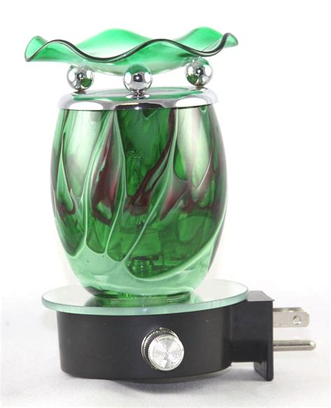 Special price $12.99 regular price $17.99. Plug In Fragrance Lamp / Tart Warmer - EB065 - Green