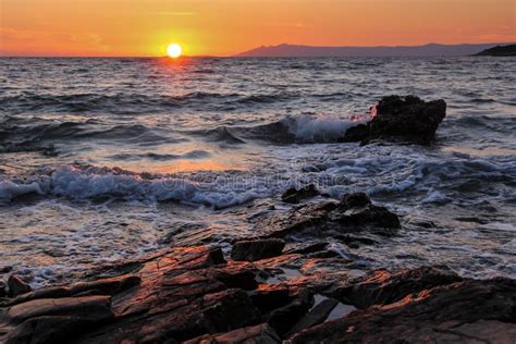 Beautiful Sunset Rocky Coast Waves Stock Photo Image Of Shimmer