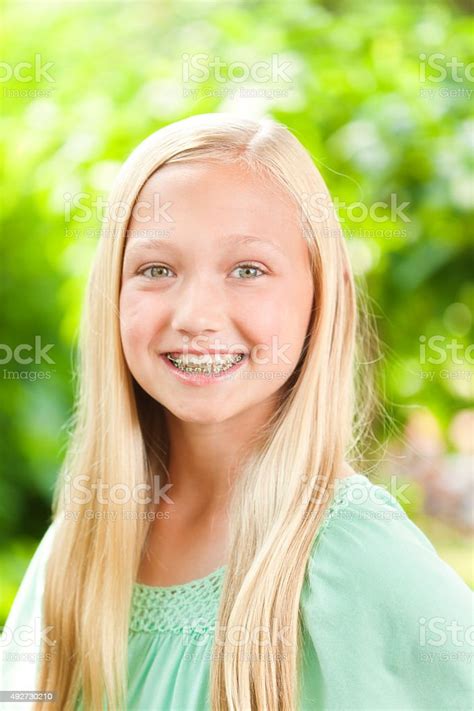 Young Caucasian Teen Girl Portrait With Dental Teeth Braces Stock Photo