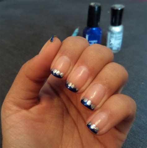 Maybe you would like to learn more about one of these? Blue French Tip Nails with Silver Dots #frenchtipnails ...